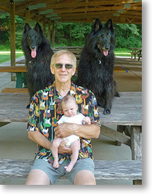 Cyan, Dad, Bing and Acacia at a picnic pavilon on during a walk.