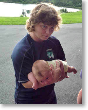 Sherry demonstrates the Airplane technique for quieting a baby.